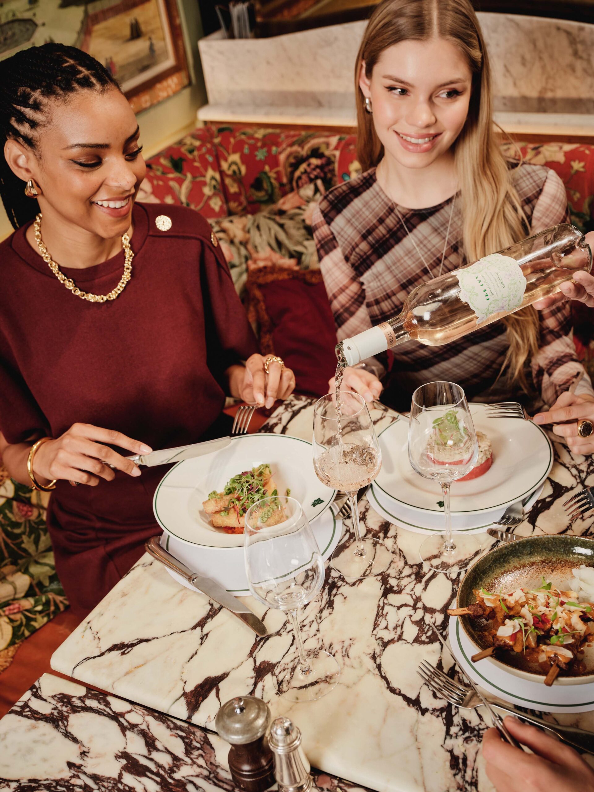 Two friends dining at The Ivy.