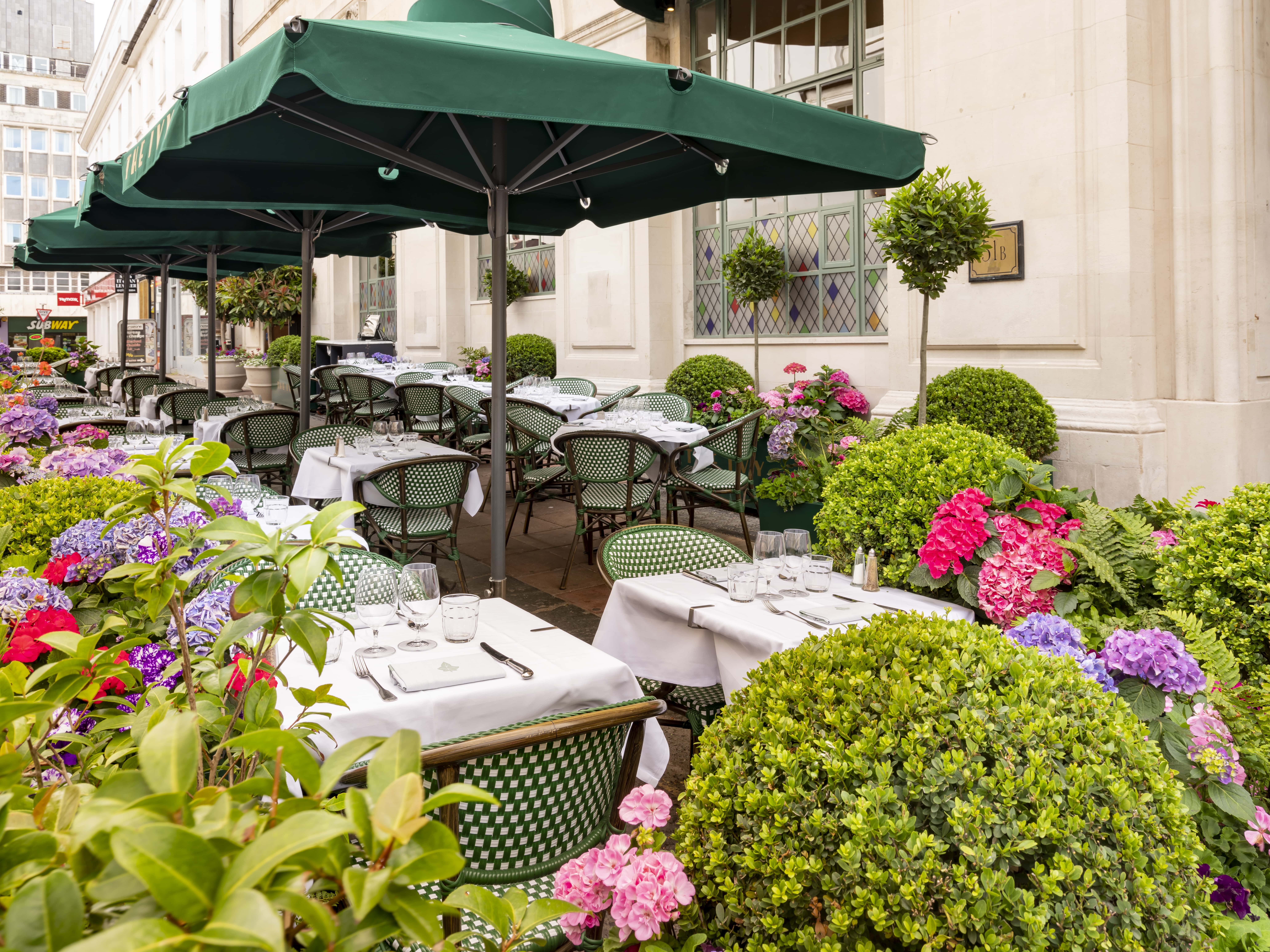 Charming terrace seating with vibrant street views