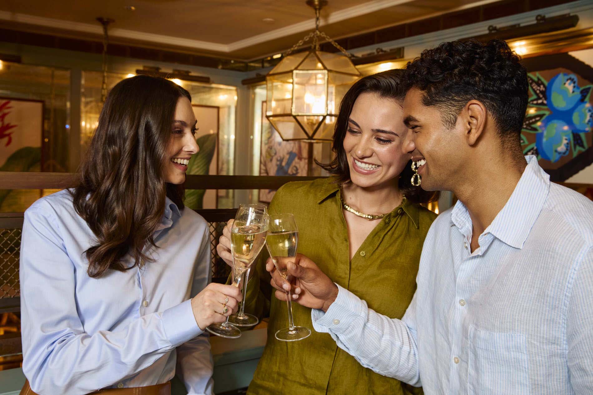 Guests having Champagne at The Ivy.