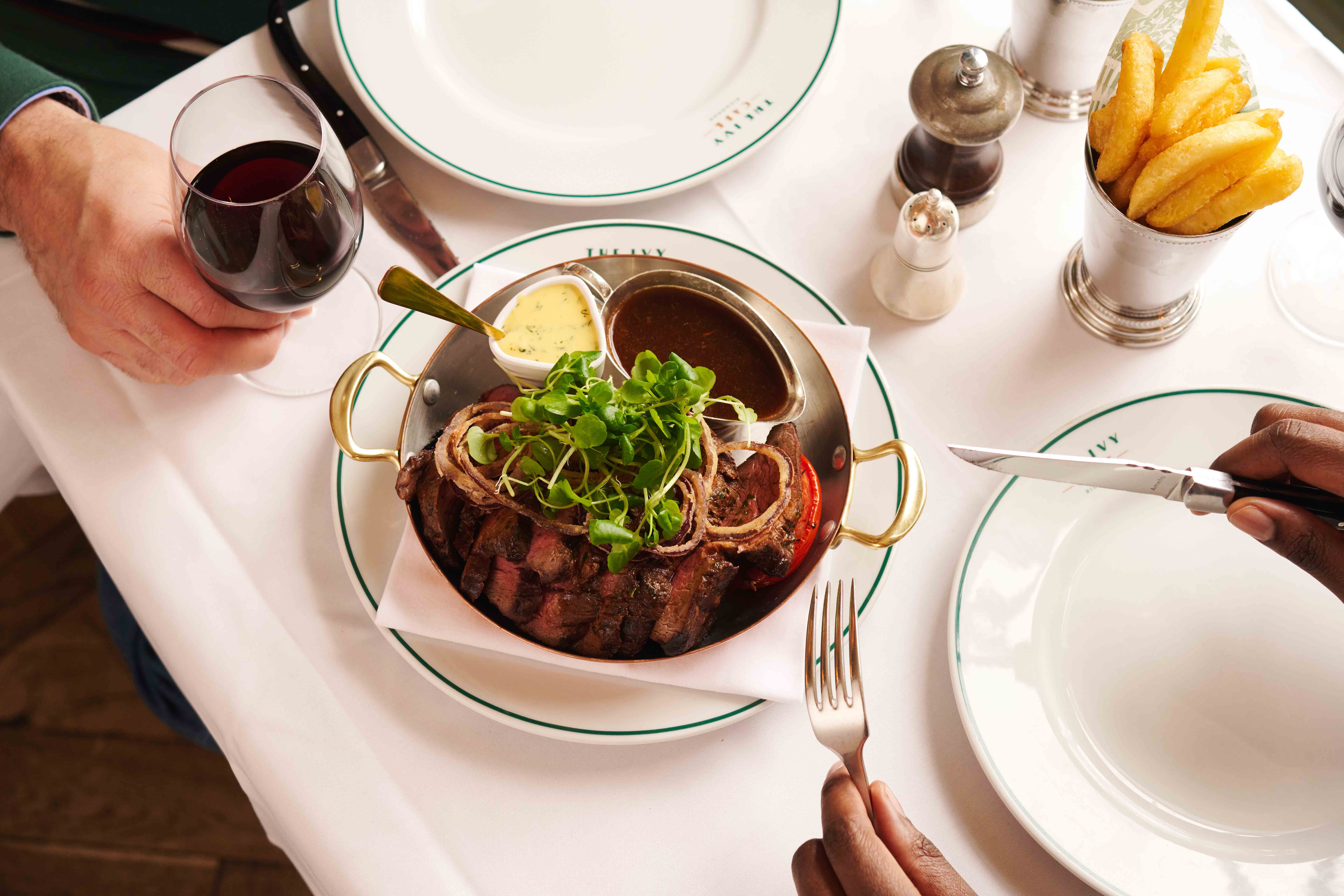 Two gentlemen dining at The Ivy.