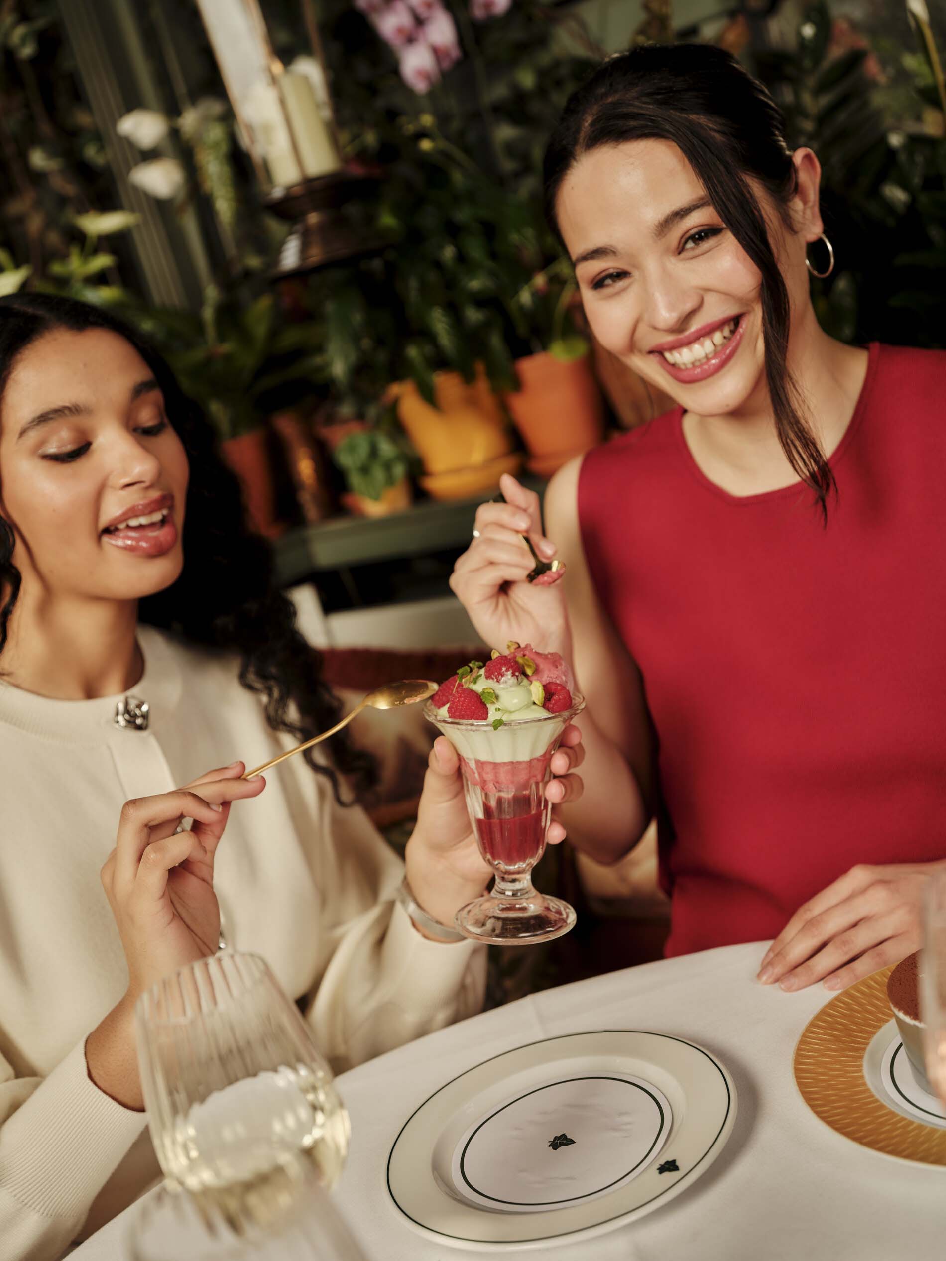 Guests sharing dessert at The Ivy.