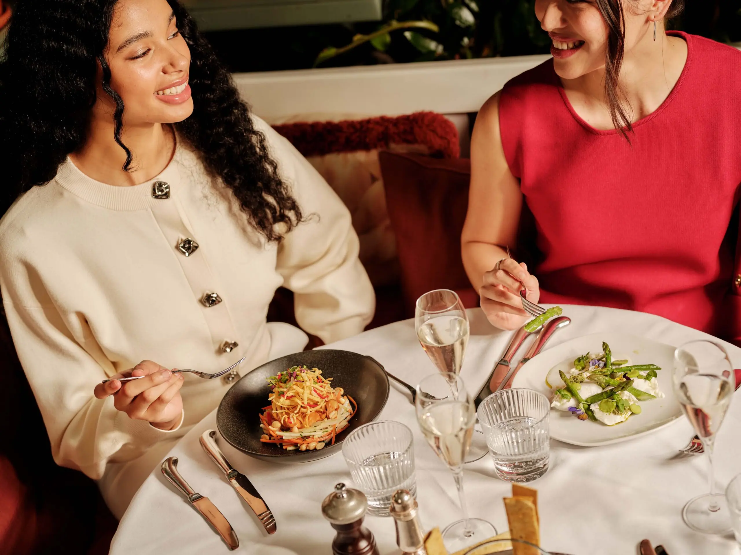 Friends having dinner at The Ivy.