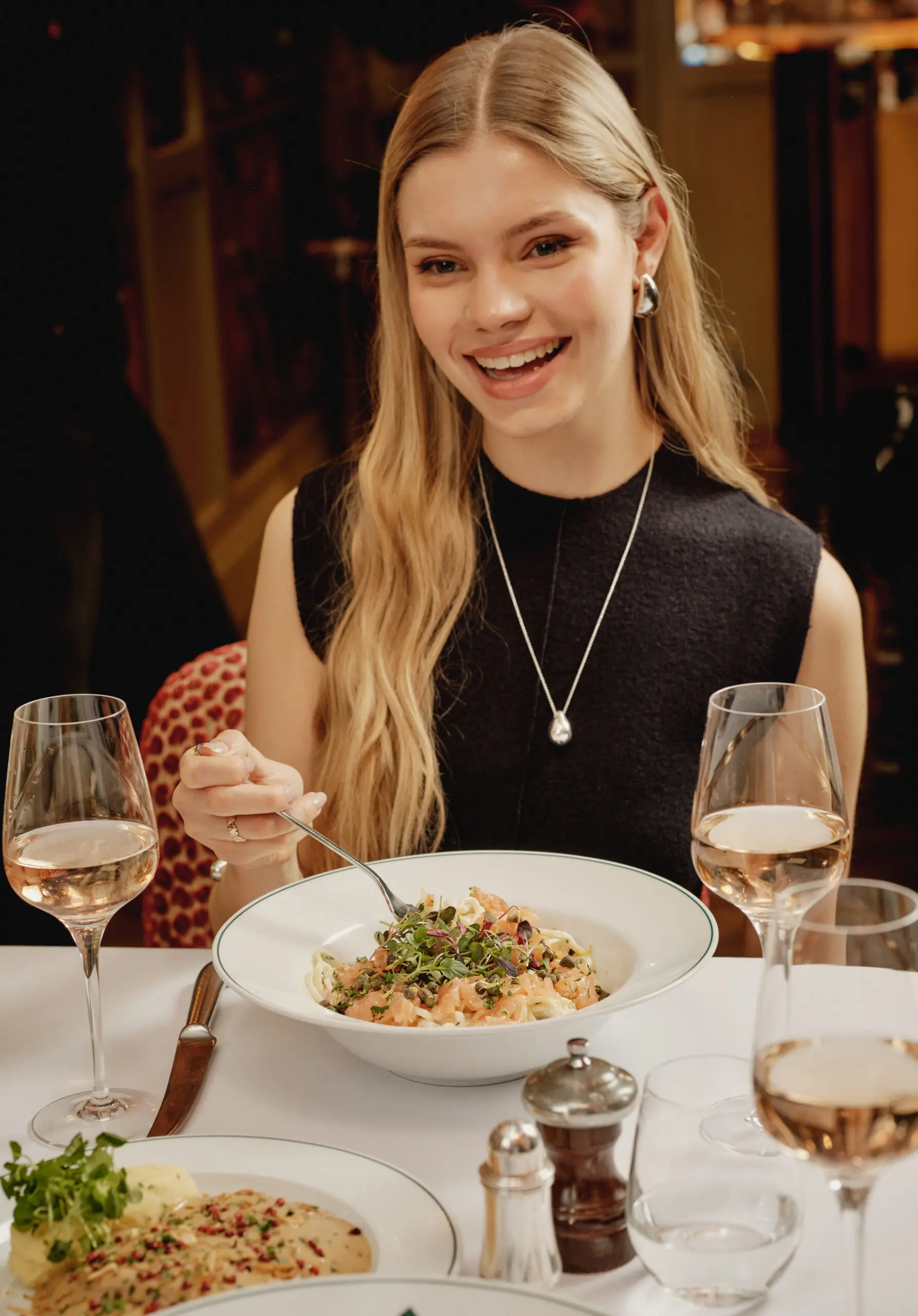 Guest having a dinner at The Ivy.