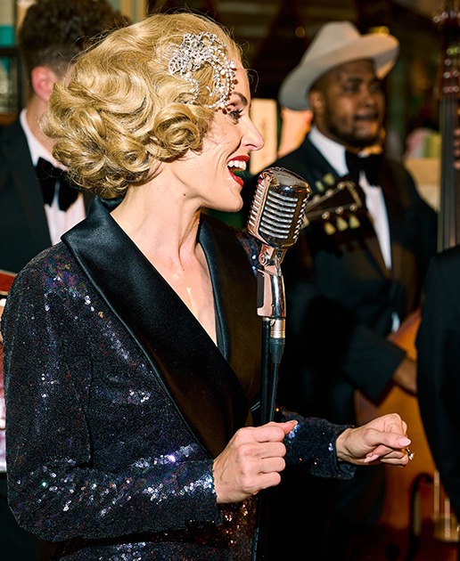 Lady Singing Dressed In 60s Jazz Night Costume