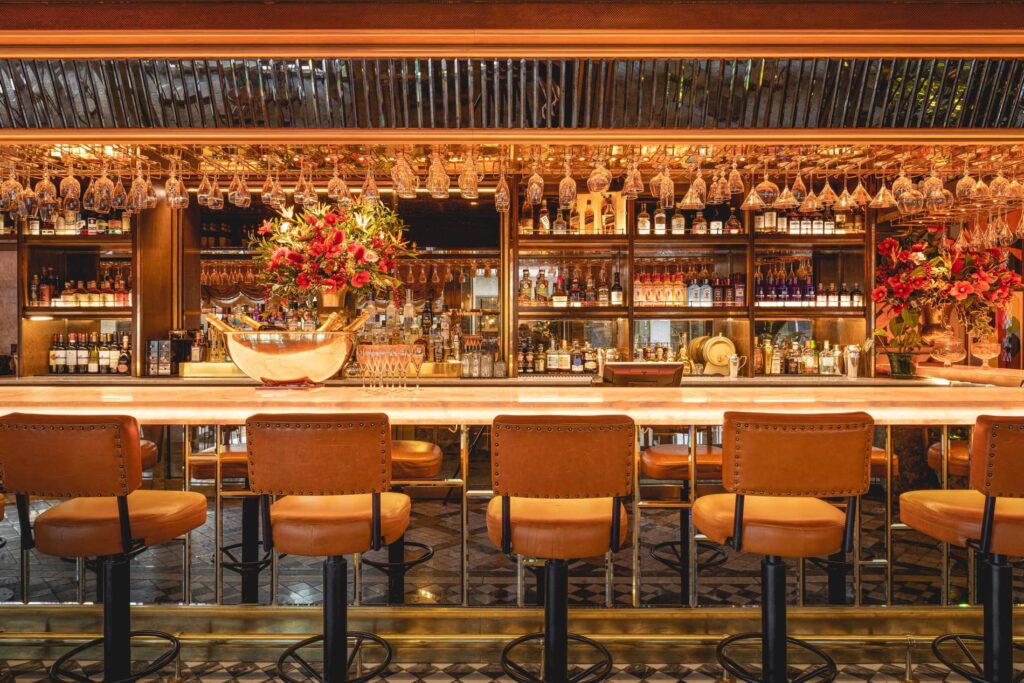 the full length of the bar at the ivy pink bar