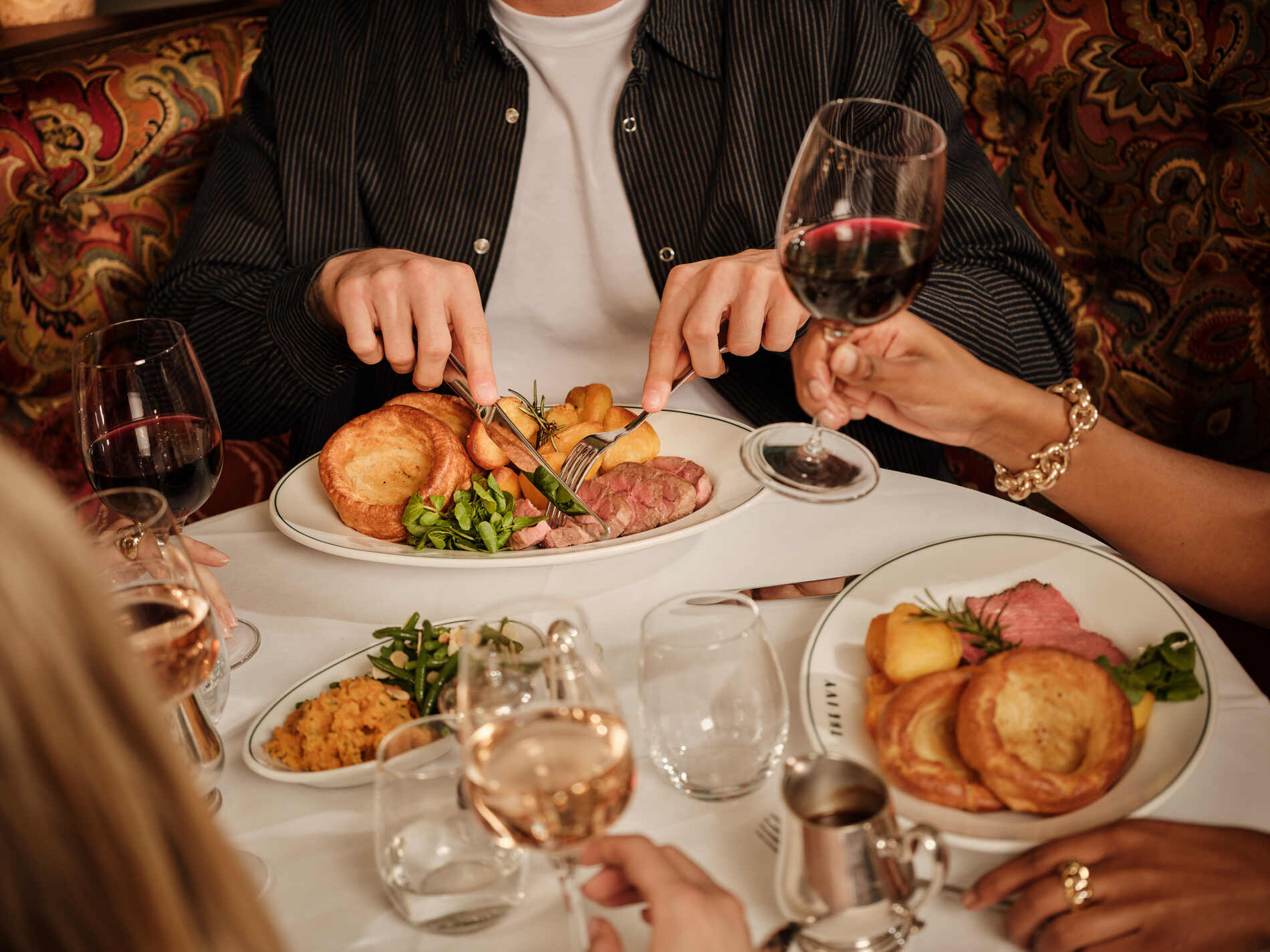 Guests having Sunday Roast at The Ivy Bath.