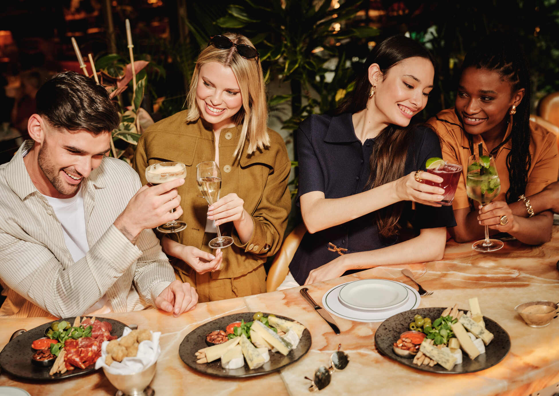 group of friends at the ivyv enjoying cockails