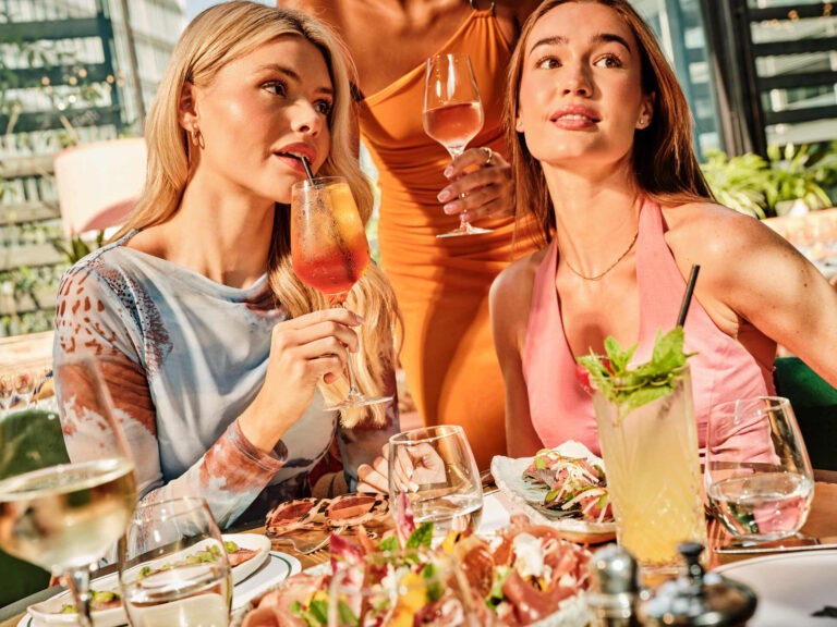 women enjoying the new rooftop menu